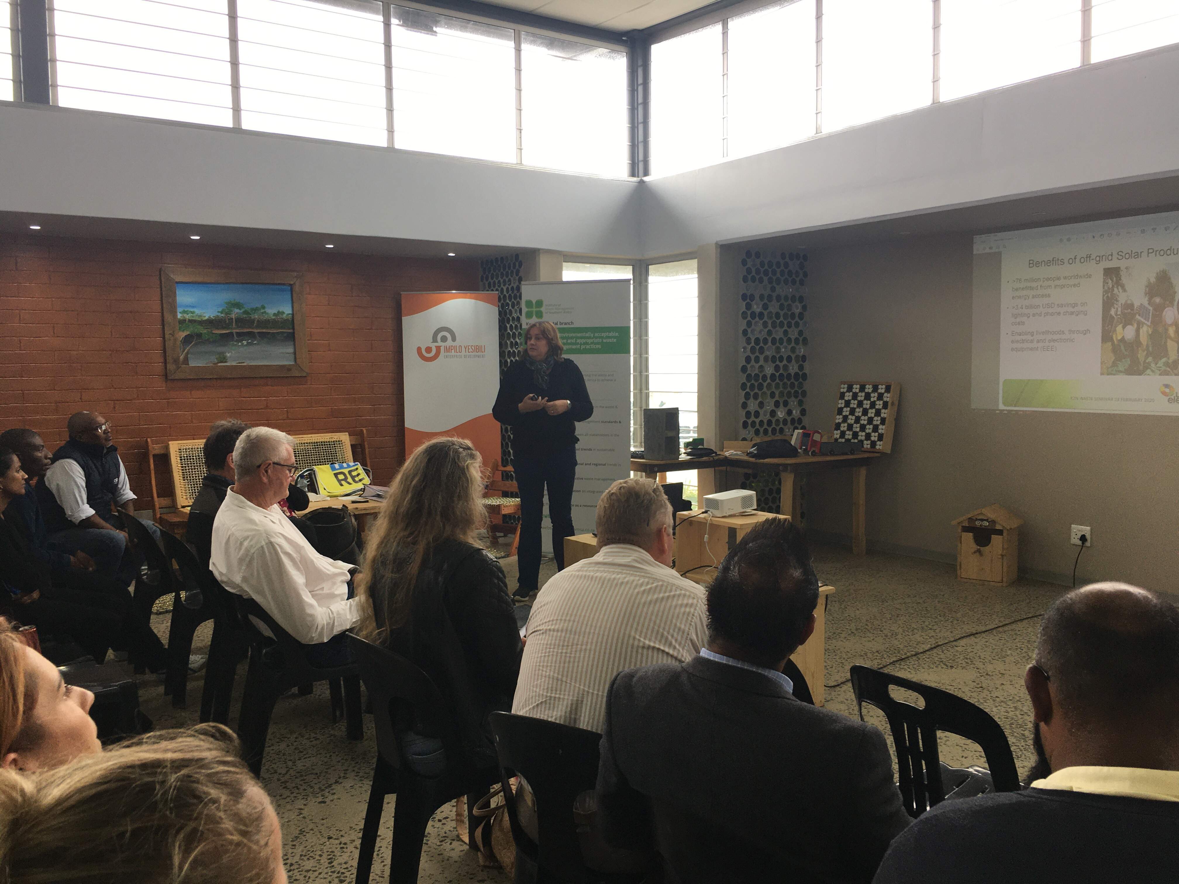 Patricia Schroder presenting on the challenges and opportunities for off-grid solar recycling